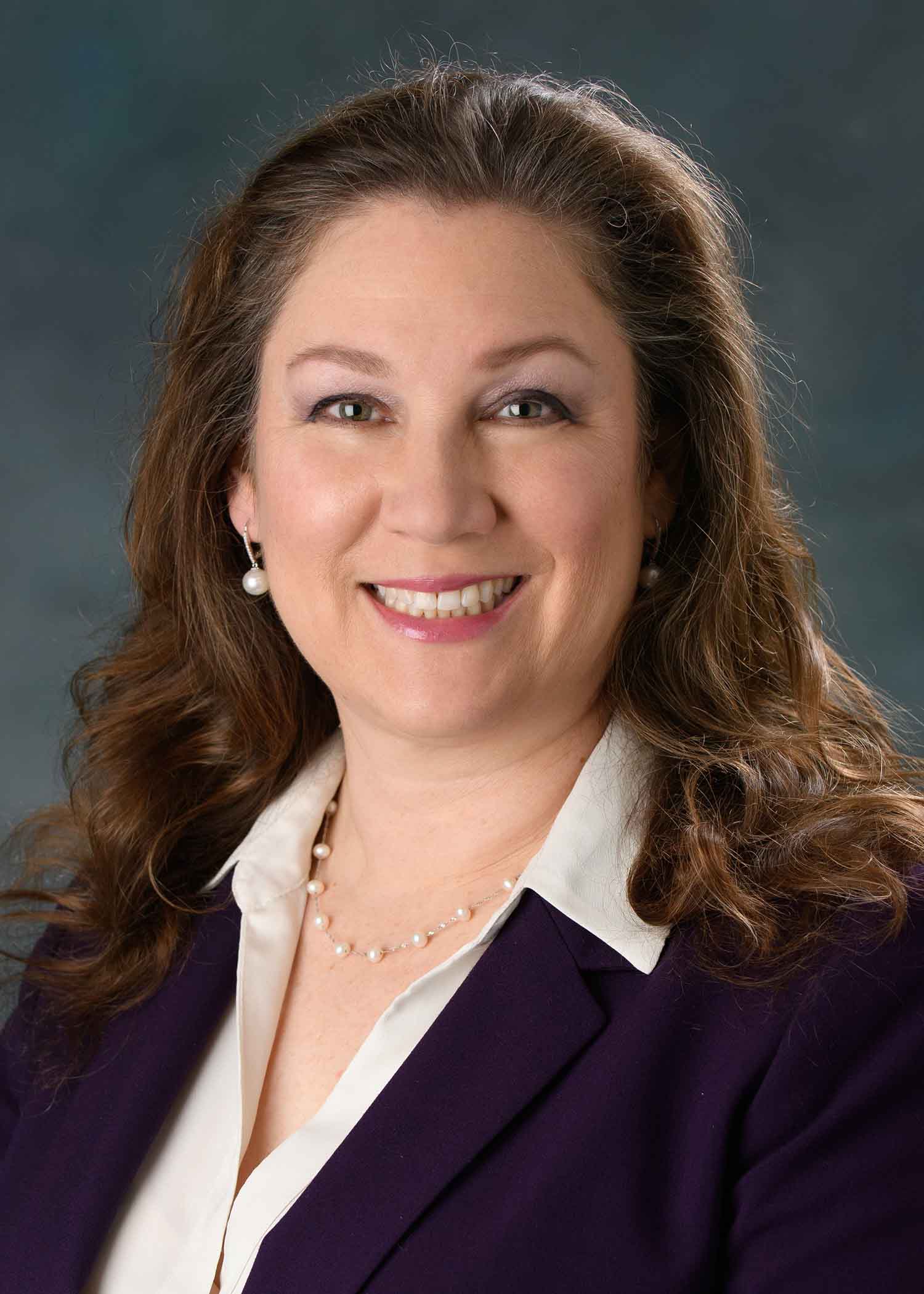 Tina Arias Miller, Ed.D.​